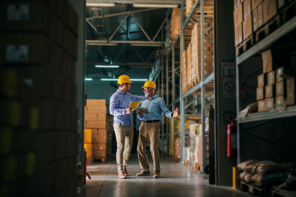 Two men consulting